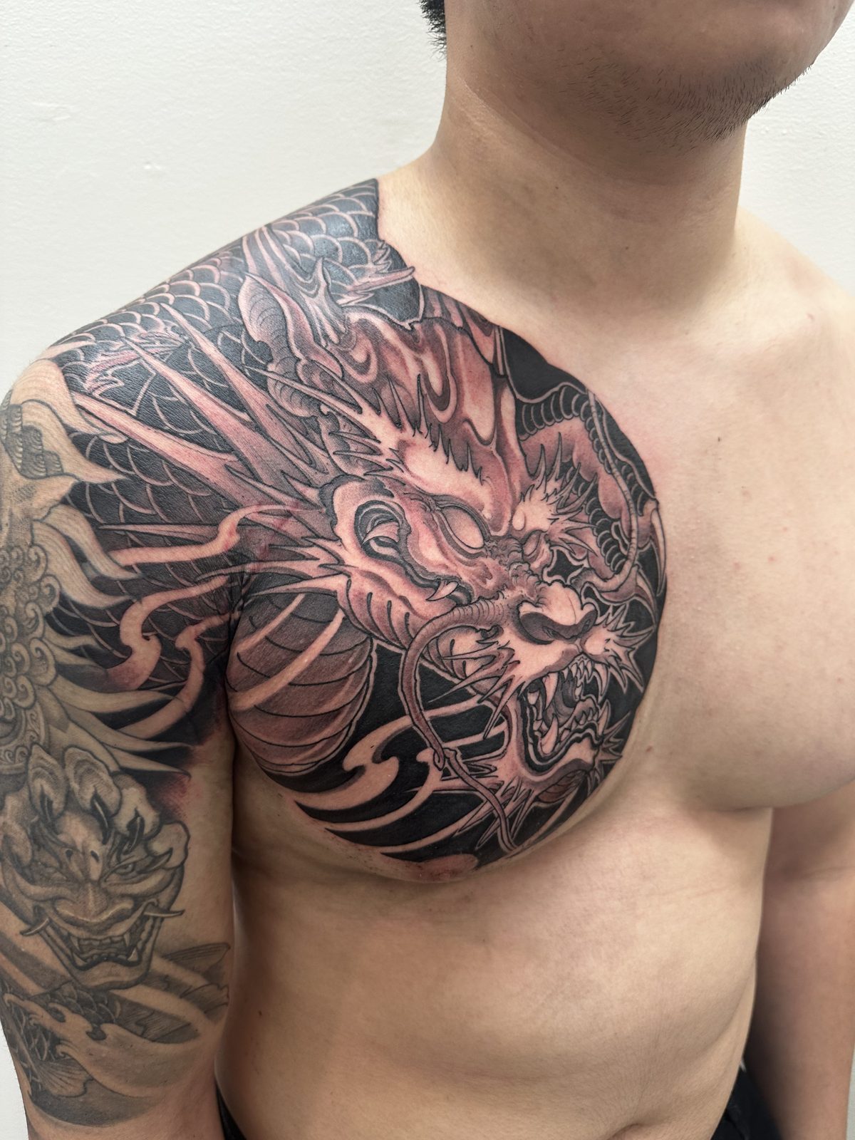 Tattoo by Noodles — Red Buddha Tattoo (piece 8 of 21)