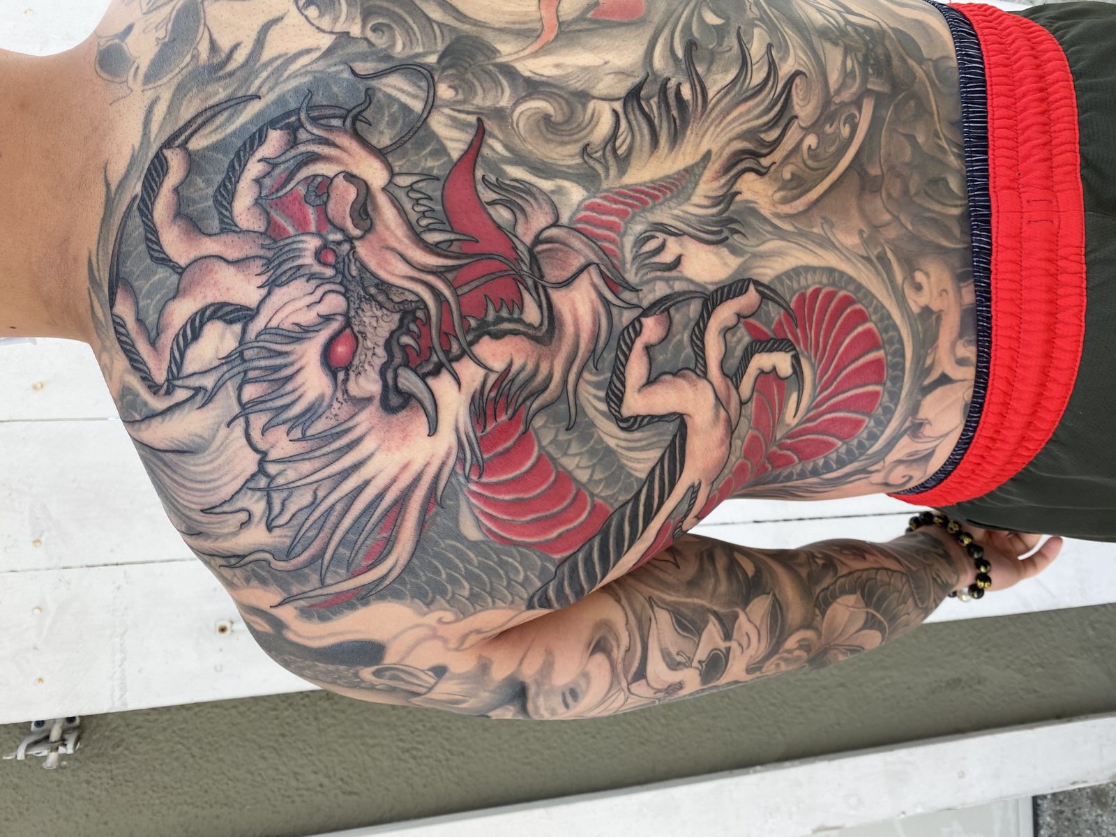 Tattoo by Noodles — Red Buddha Tattoo (piece 15 of 21)