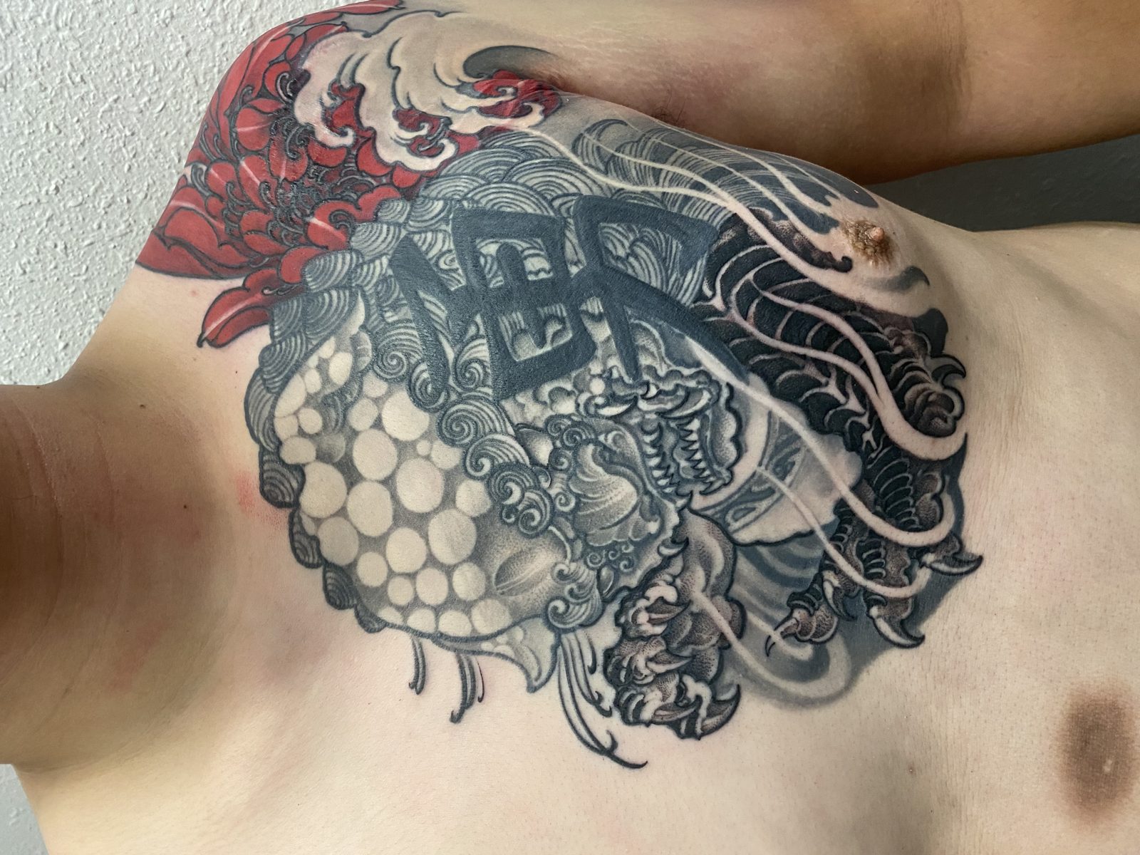 Tattoo by Noodles — Red Buddha Tattoo (piece 16 of 21)