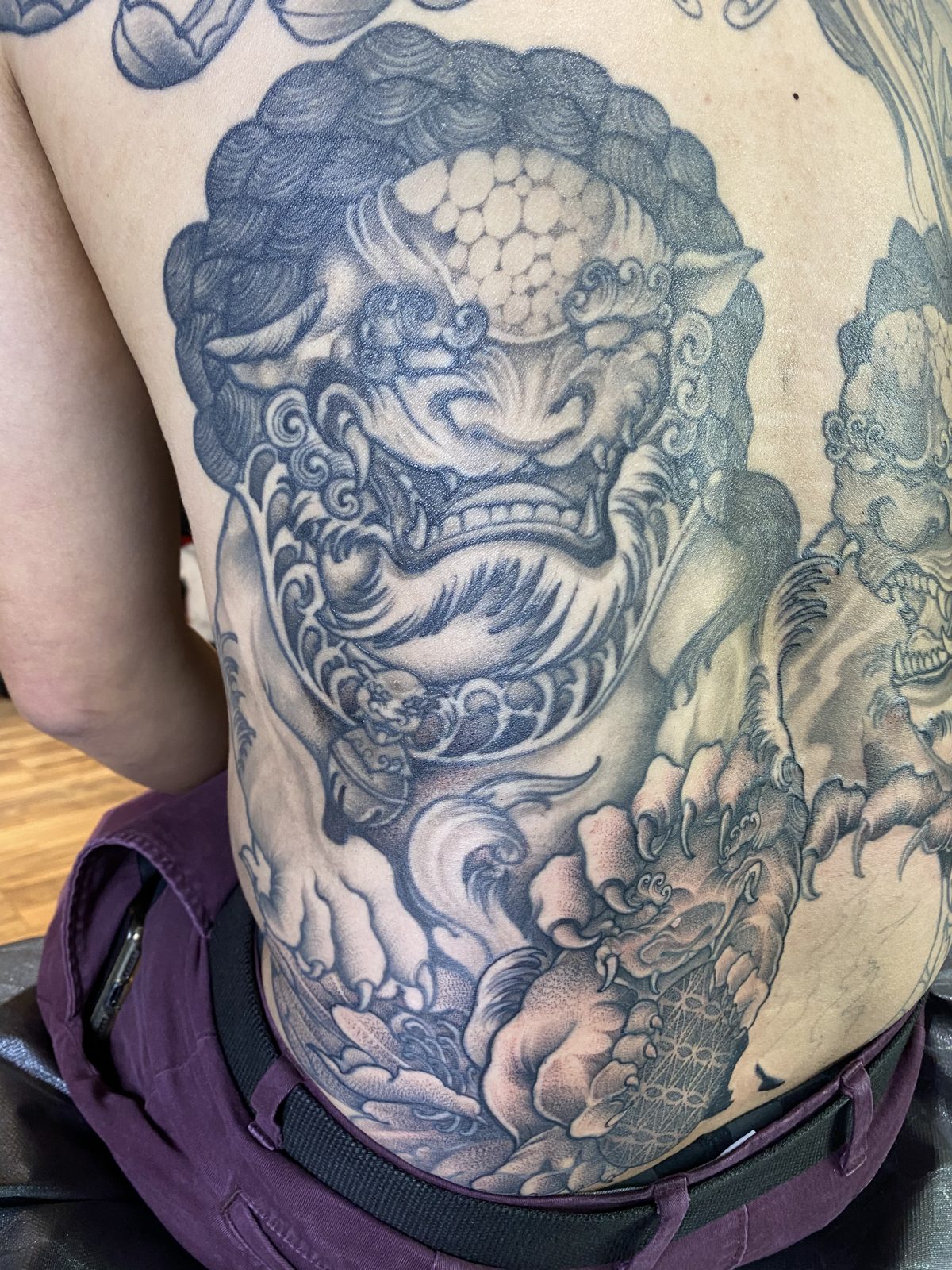 Tattoo by Noodles — Red Buddha Tattoo (piece 17 of 21)