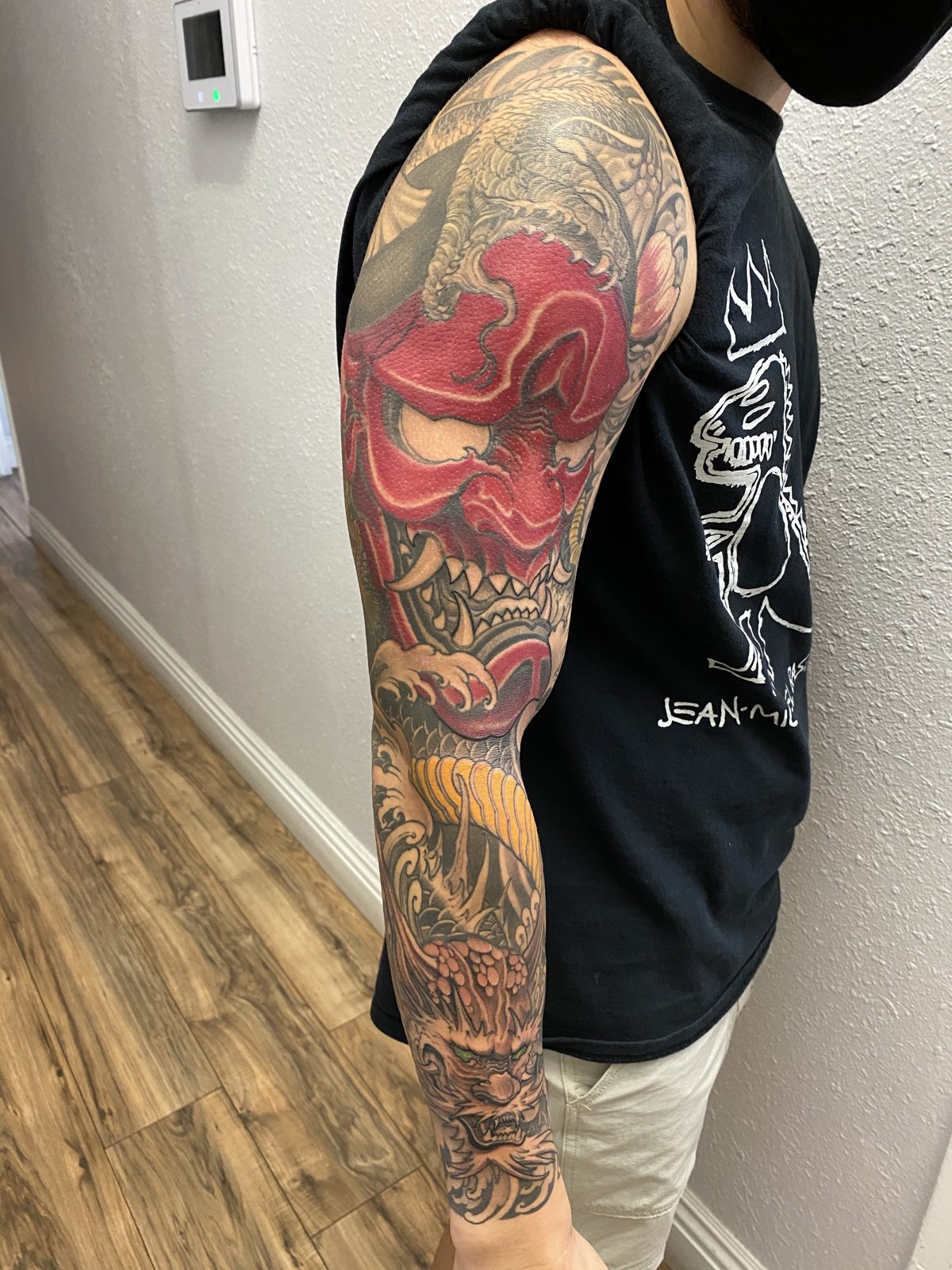 Tattoo by Noodles — Red Buddha Tattoo (piece 21 of 21)